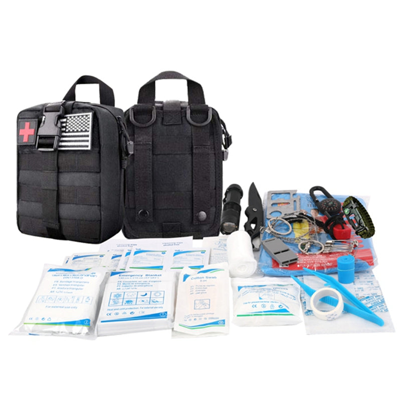 A variety of medical supplies are laid out on a white background, likely the contents of a first-aid kit.