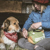 The man and the dog with Portable Pet First Aid Kit